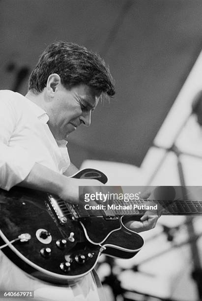 English guitarist and composer John McLaughlin performing with the One Truth Band at the Dr Pepper Music festival in Central Park, Manhattan, New...