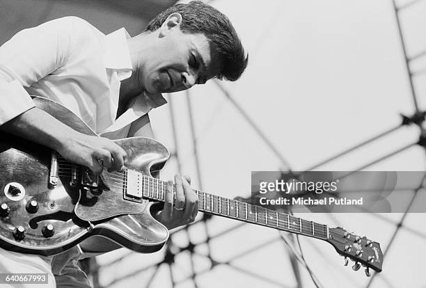 English guitarist and composer John McLaughlin performing with the One Truth Band at the Dr Pepper Music festival in Central Park, Manhattan, New...