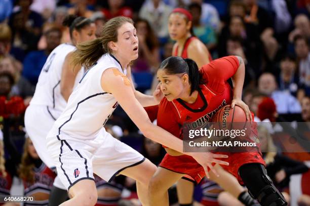 Breanna Stewart of the University of Connecticut pressures Monique Reid of the University of Louisville during the Division I Women's Basketball...