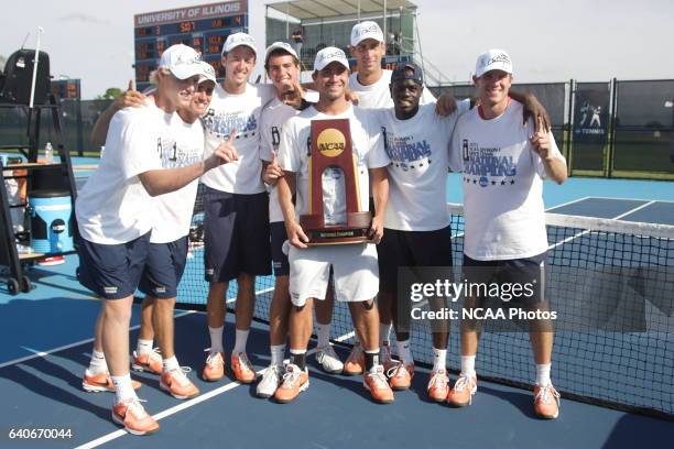 Team members from the University of Virginia pose with championship trophy after defeating the University of California - Los Angeles at the Division...