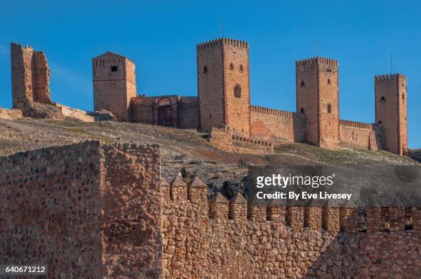 the 4 remaining towers and outside wall of molina de aragon castle - guadalajara fotografías e imágenes de stock