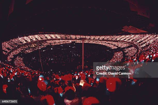 Spectators in the Olympic Stadium watch the Closing Ceremony of the XXIV Summer Olympic Games on 1 October 1988 at the Seoul Olympic Stadium in...