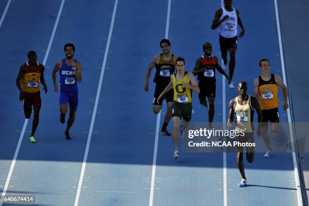 Charles Jock of UC Irvine races his way toward a first place finish in the men's 800 meter race during the Division I Men's and Women's Outdoor Track...