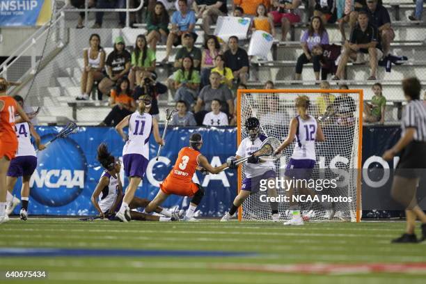 Goalie Brianne LoManto of Northwestern University makes a save against Kailah Kempney of Syracuse University during the Division I Women?s Lacrosse...