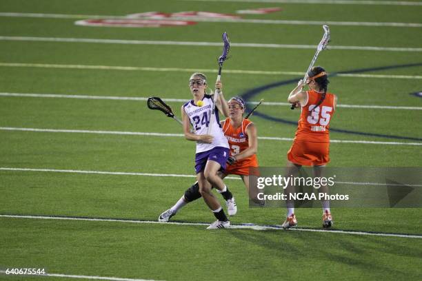 Christy Turner of Northwestern University is fouled by Kailah Kempney of Syracuse University during the Division I Women?s Lacrosse Championship held...