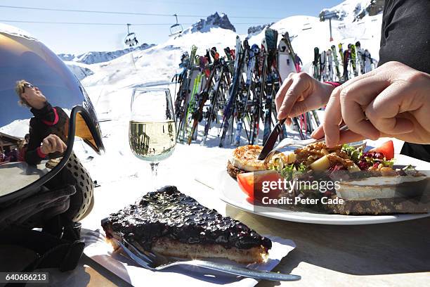woman eating lunch in ski resort - after ski bildbanksfoton och bilder