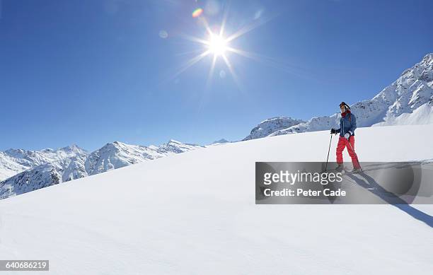 woman on ski slope - ski hill stock pictures, royalty-free photos & images
