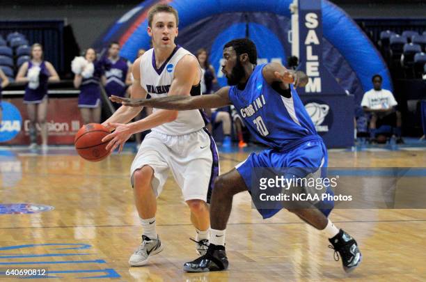 Cory Lemons of Cabrini College defendsAlex Merg of the University Wisconsin-Whitewater during the Division III Men's Basketball Championship held at...