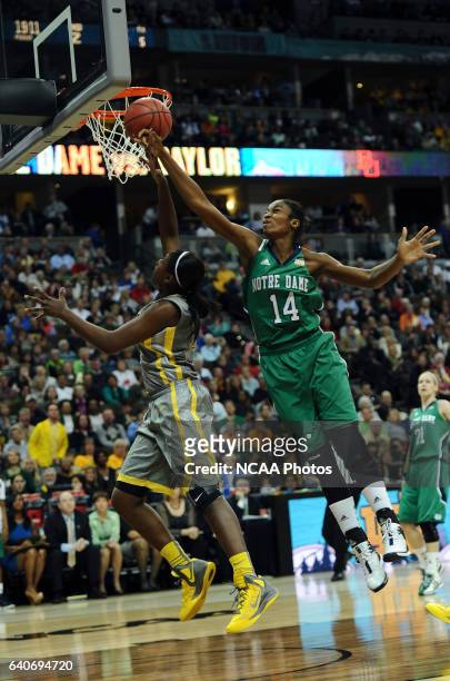 Devereaux Peters of the University of Notre Dame attempts to block a shot of Destiny Williams of Baylor University during the Division I Women's...