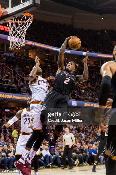 James Jones of the Cleveland Cavaliers puts pressure on Eric Bledsoe of the Phoenix Suns shoots during the second half at Quicken Loans Arena on...