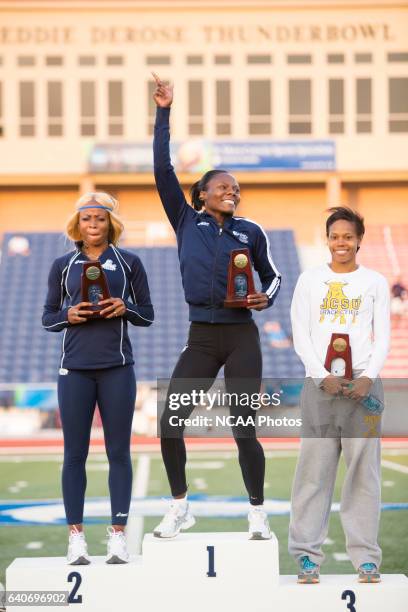 Michelle Cumberbatch of Lincoln University celebrates on the podium following her victory in the Women's 400 Meter Hurdles at the NCAA Photos via...