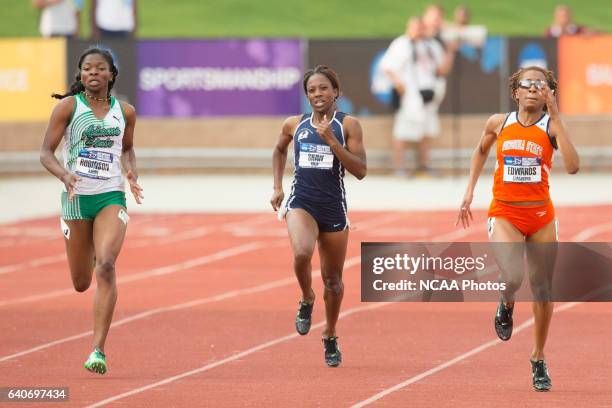 Kayon Robinson of Adams State University closes in Samantha Edwards of Virginia State University in the Women's 400 Meter Dash during the NCAA Photos...