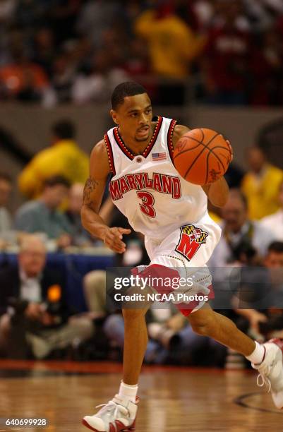 Juan Dixon of Maryland pushes the ball upcourt during the NCAA Photos via Getty Images Men's Division I Basketball Championships held at the Georgia...