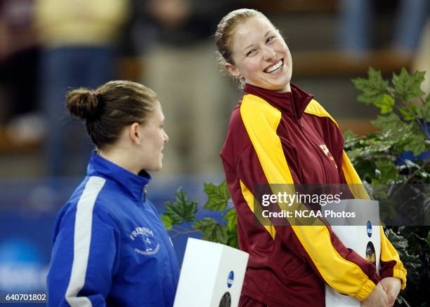 Erica Deur of Calvin College smiles after receiving her award for winning the Women's 1 meter Diving Championships at the Division III Women's...