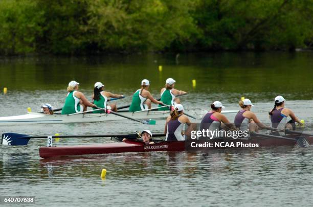 Nova Southeastern University, led by coxswain Heather Clayton, races toward the finish line of the Fours Grand Final at the NCAA Photos via Getty...