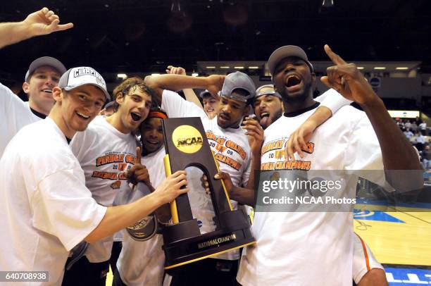Aaron Laflin , Tyler Evans , Marcus Parker , Josh Bostic , Morgan Lewis and Lee Roberts of Findlay celebrate with the championship trophy after...