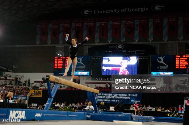 Kristina Baskett of the University of Utah competes on the beam during the Division I Women?s Gymnastics Championship held at Stegeman Coliseum on...