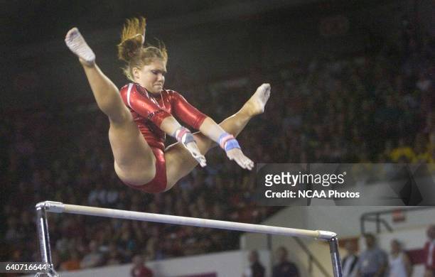 Courtney McCool of the University of Georgia competes on the uneven parallel bars during the Division I Women?s Gymnastics Championship held at...
