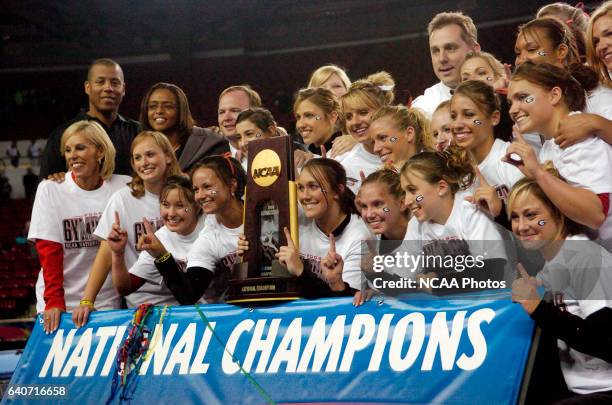 Members of the University of Georgia women's gymnastics team celebrate winning the Division I Women?s Gymnastics Championship held at Stegeman...