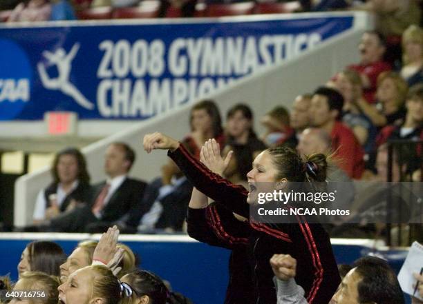 Stephanie Neff of the University of Utah cheers on her team during the Division I Women?s Gymnastics Championship held at Stegeman Coliseum on the...