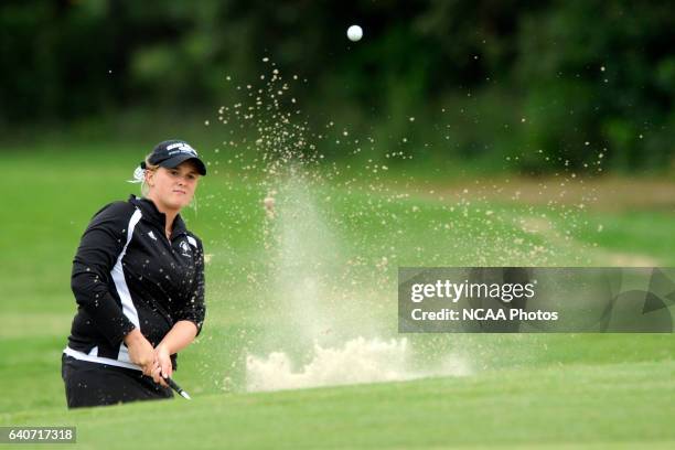 Catlin Bennett of Grand Valley State hits a shot out of the sand trap during the Division II Women's Golf Championship held at Memorial Park in...