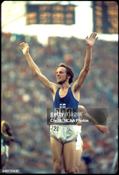 Lasse Viren of Finland raises his arms after wining the 10,000 m race during the Olympic games in Munich, West Germany. Viren also won the 5,000 m...