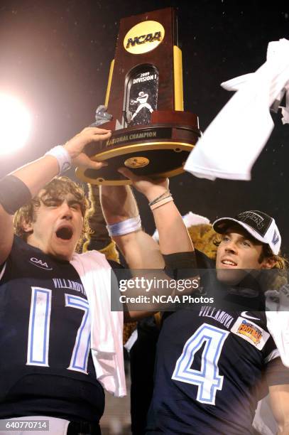 Chris Whitney and Matt Szczur of Villanova University show off their trophy after defeating the University of Montana during the Division I Men's...