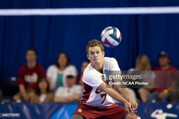 Luke Morris of the University of Southern California digs a serve from the University of California, Irvine in the finals of the NCAA Photos via...