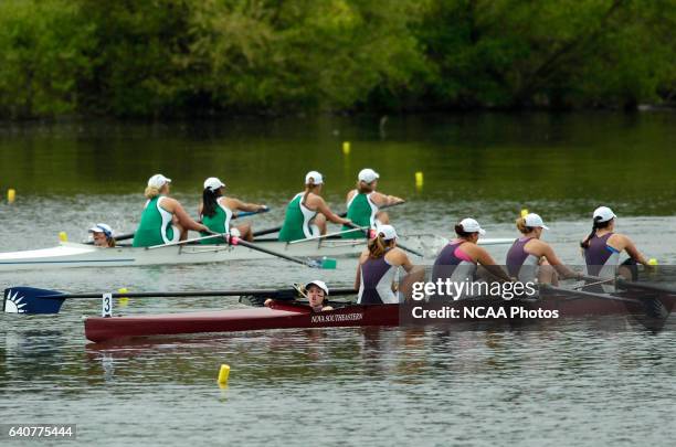 Nova Southeastern University, led by coxswain Heather Clayton, races toward the finish line of the Fours Grand Final at the NCAA Photos via Getty...