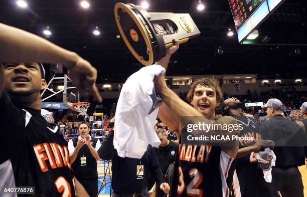 Josh Bostic and Tyler Evans of Findlay celebrate with the trophy during the Division II Men's Basketball Championship held at the MassMutual Center...