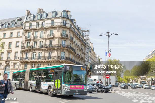 traffic on boulevard saint germain - boulevard saint germain stock pictures, royalty-free photos & images