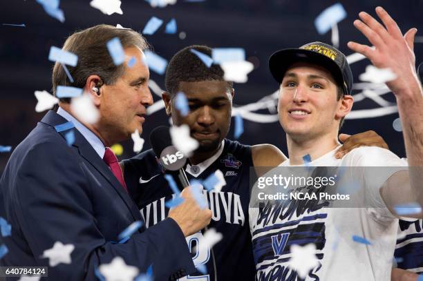 Jim Nantz of CBS speaks with Ryan Arcidiacono and Kris Jenkins of Villanova University after their victory against the University of North Carolina...