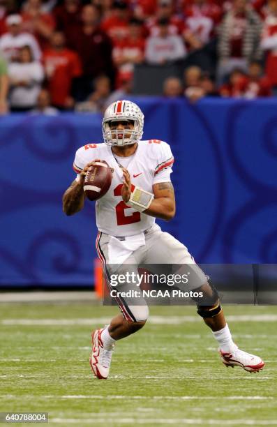 Quarterback Terrelle Pryor of Ohio State University looks for an open receiver against the University of Arkansas during the Allstate Sugar Bowl held...