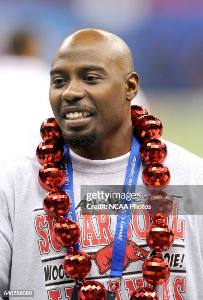 Former Arkansas Razorback Felix Jones of the Dallas Cowboys shows some of his hog spirit on the field during the Allstate Sugar Bowl held at the...