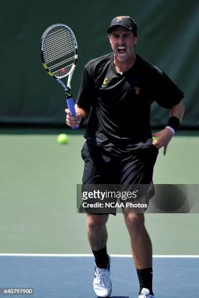 Steve Johnson of the University of Southern California celebrates a point against the University of Virginia during singles play at the Division I...