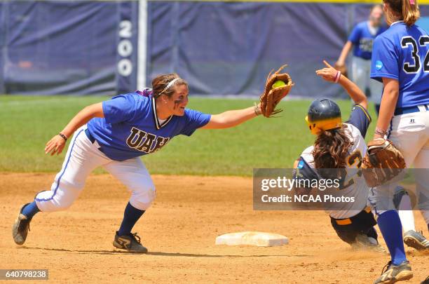 University of Alabama-Huntsville shortstop Kathryn Whitlock misses a tag on Sarah Woofter of the University of California San Diego during the...