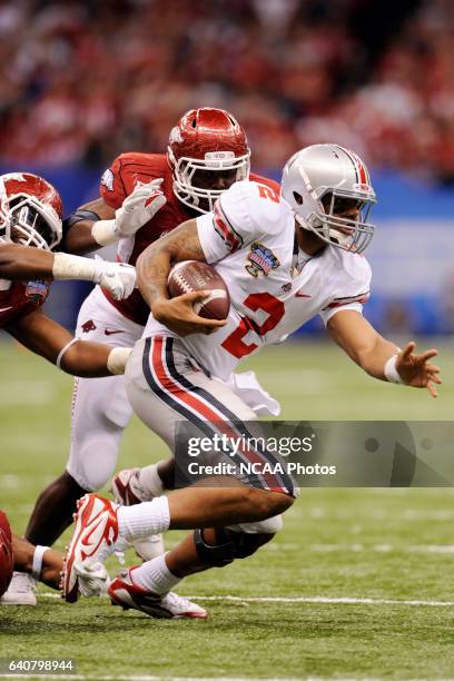 Quarterback Terrelle Pryor of Ohio State University takes off for a run against the University of Arkansas during the Allstate Sugar Bowl held at the...