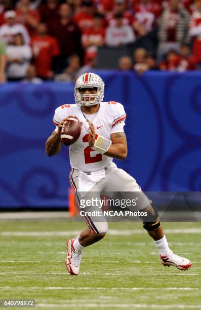 Quarterback Terrelle Pryor of Ohio State University looks for an open receiver against the University of Arkansas during the Allstate Sugar Bowl held...