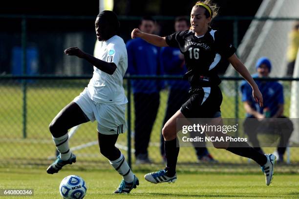 Kayla Addison of GVSU and Derith Fernandes of Saint Rose battle for the ball during the Division II Women’s Soccer Championship held at the Ashton...