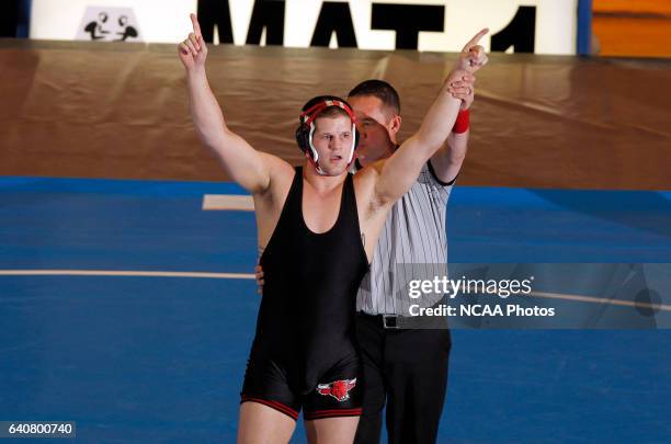 Aaron Denson of Nebraska-Omaha celebrates after defeating Charlie Pipher of Western State during the Division II Men's Wrestling Championship held at...