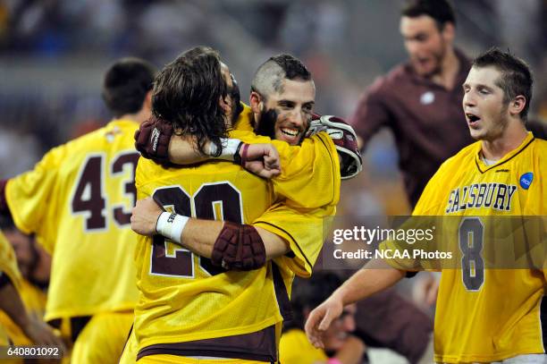 Nick Mooney and Matt Cannone of Salisbury University celebrate their victory over Tufts University during the Division III Men's Lacrosse...