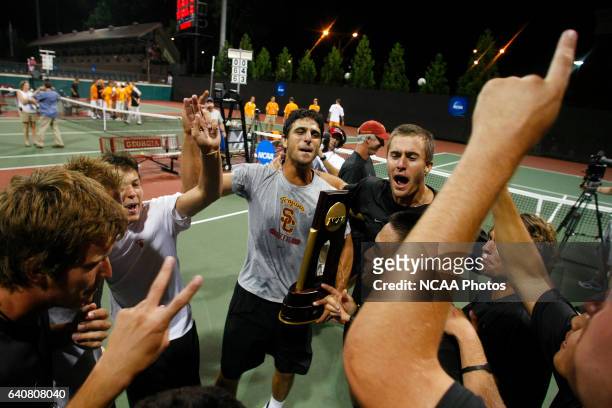 The University of Southern California celebrates after defeating the University of Tennessee during the Division I Men's Tennis Championship held at...