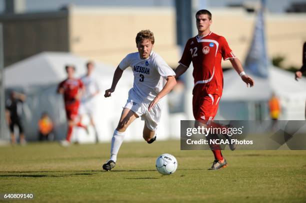 Geoff Pezon of Messiah College lines up the winning goal against Lynchburg College in overtime during the Division III Men's Soccer Championship held...