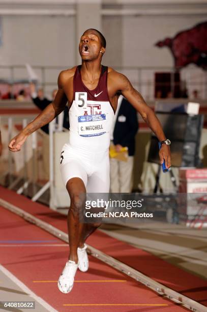 Curtis Mitchell of Texas A&M races across the finish line as the final leg of the 4X400 meter relay during the Division I Men's and Women's Indoor...