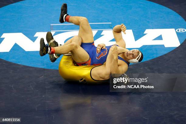 Maxwell Askren of Missouri wrestles Kirk Smith of Boise State during the Division I Men's Wrestling Championship held at the Qwest Center in Omaha,...