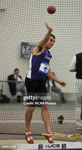 Josh Lovell, a senior from Linfield College, competes in the shotput portion of the men's pentathlon during the Division III Men's and Women's Indoor...