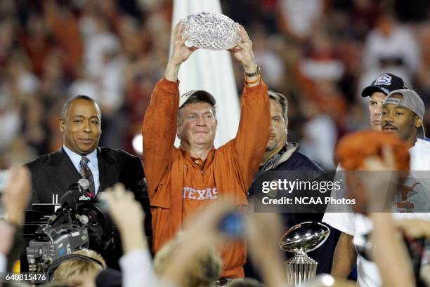 Head Coach Mack Brown of the University of Texas celebrates the Longhorns victory over the University of Southern California during the BCS National...