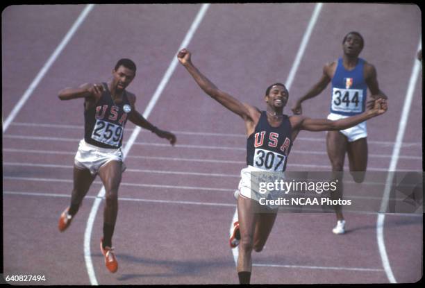 Tommie Smith of the US wins the gold medal in the 200m and John Carlos finishes 3rd at the Olympics in Mexico City, Mexico. Smith set a world record...