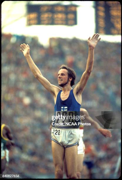 Lasse Viren of Finland raises his arms after wining the 10,000 m race during the Olympic games in Munich, West Germany. Viren also won the 5,000 m...