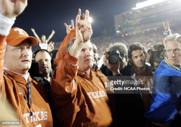 Head Coach Mack Brown of the University of Texas celebrates his teams' victory over the University of Southern California during the BCS National...